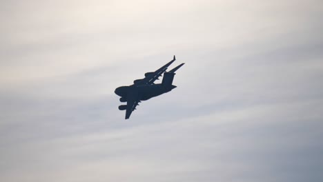 Silhouette-of-the-C17-Military-Cargo-Airplane-Flying-TRACK