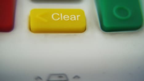 A-macro-close-up-shot-of-a-pin-pad-numbers-and-letters-on-colorful-buttons,-smooth-pull-down-movement,-Full-HD-video,-super-slow-motion,-blurry-depth-of-field