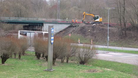 Railroad-bridge-reconstruction-at-Rudna-and-Ostravska-street-between-Havirov-and-Senov-in-Czech-Republic,-excavator-prepared