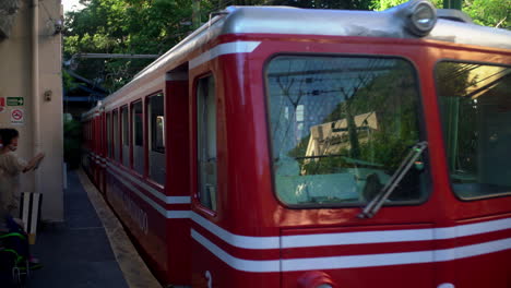 The-distinctive-red-train-offers-a-journey-specifically-tailored-to-reach-the-Cristo-Redentor-in-Rio-de-Janeiro,-Brazil