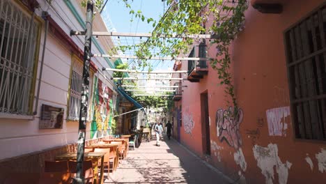 Charming-Street-With-Cafe-Tables-And-Chairs-On-Sunny-Day-in-Santa-Marta-In-Colombia