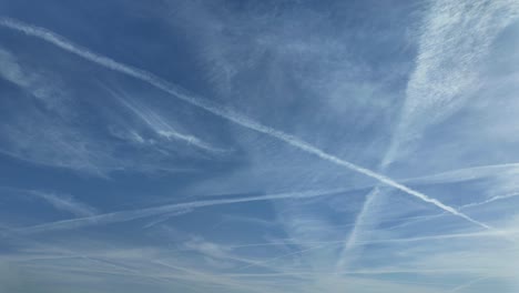 Blue-sky-with-contrails-timelapse