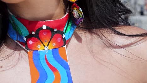 Woman-models-Huichol-art-fashion-accessories-outdoors