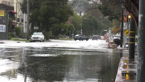 Cars-Pass-Through-Flooded-Roadway