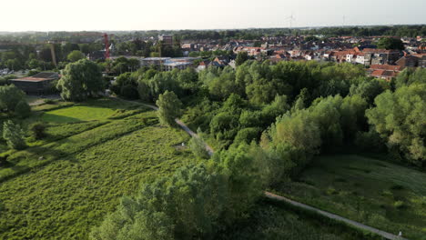 Aerial-View-of-Pathway-Through-Natural-Reserve-of-Bourgoyen-Ossemeersen,-Ghent,-Belgium