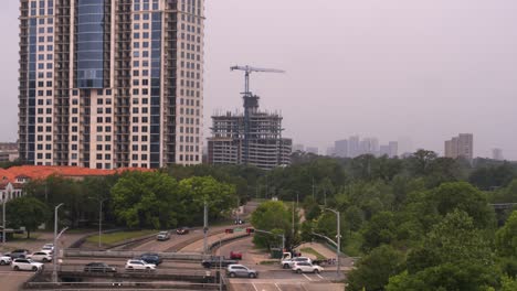 Drone-view-of-Allen-Parkway-in-Houston,-Texas