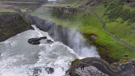 Aerial-View-of-Powerful-Gullfoss-Waterfall-and-River-Canyon,-Popular-Tourist-Attraction-of-Iceland