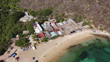 La-Entrega-Beach-at-popular-tourist-district-Huatulco,-Oaxaca,-Mexico