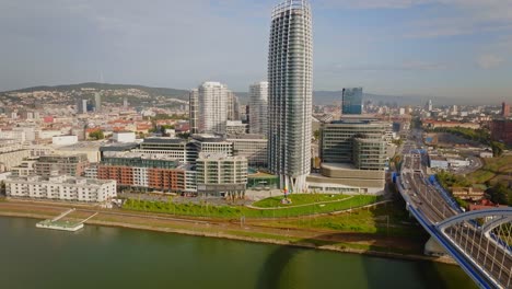 Skyscraper-"Eurovea-Tower"-near-Eurovea-gallery-shopping-mall-on-Danube-riverside-on-sunny-day