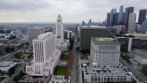 Aerial-View-of-Los-Angeles-City-Hall,-Courthouse,-Hall-of-Justice-and-North-Spring-Street-Traffic,-California-USA