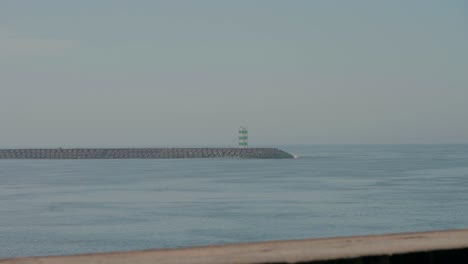 Gloomy-Seascape-with-Distant-Lighthouse