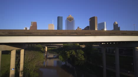 Wide-angle-reveal-drone-view-of-buildings-in-downtown-Houston,-Texas