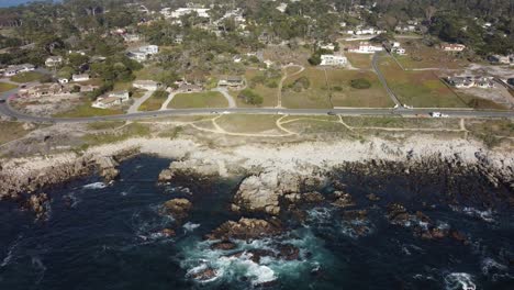 Aerial-drone-footage-zooming-out-of-Asilomar-Beach-in-Monterey