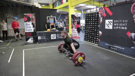 Male-athlete-performing-a-snatch-in-slow-motion-and-failing