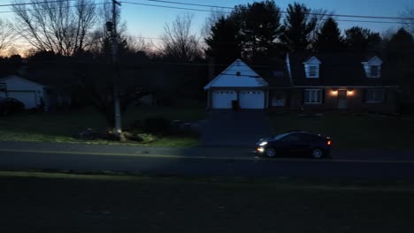 American-street-lined-with-houses-at-night