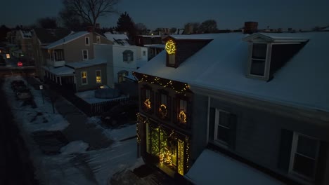 Aerial-view-of-Lighting-Christmas-decorated-Home-at-night