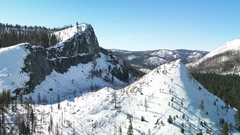 Aerial-view-of-valley-amongs-mountain-landscape,-El-Dorado-National-Forest,-California