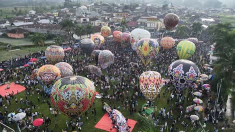 Aerial-view,-hot-air-balloon-festival-in-Kembaran-village,-Wonosobo