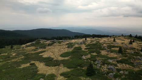 Aerial-View-Over-a-Barren-Peak-in-Vitosha-Mountains-Reveals-the-Valley