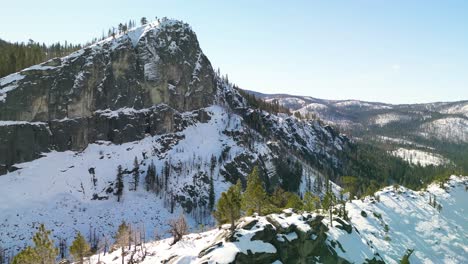 Aerial-view-along-mountain-ridge,-Rocky-Canyon,-Strawberry,-California-in-winter