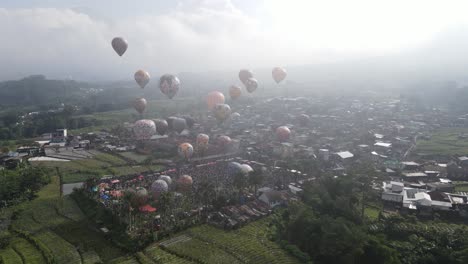 Aerial-view,-hot-air-balloon-festival-in-Kembaran-village,-Wonosobo