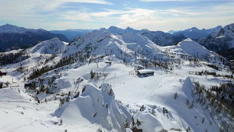 Beautiful-view-of-the-Nassfeld-Alpine-ski-resort-with-various-pistes-from-a-distance-during-winter-in-Austria