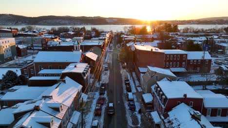 Historic-town,-Columbia,-Pennsylvania-at-sunset-during-snowy-winter-evening