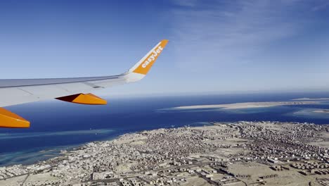 easyJet-Plane-Flying-Over-Hurghada-City-Along-The-Red-Sea-In-Egypt