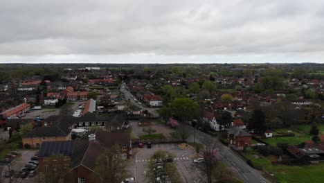 Rising-up-drone-shot-of-Bungayon-a-cloudy-day-in-Suffolk,-UK