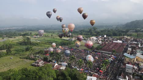 Aerial-view,-hot-air-balloon-festival-in-Kembaran-village,-Wonosobo