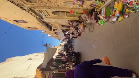 Vertical,-Stands-and-Stalls-in-Old-Medina-Souk-of-Fez,-Morocco