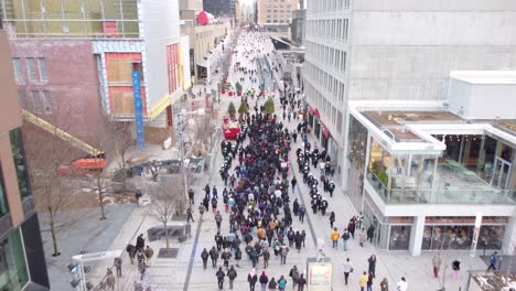 People-during-a-protest-in-the-middle-of-an-avenue-in-the-city-of-Montréal,-Québec,-Canada