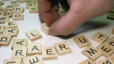 Closeup:-Drug-word-acronym-LSD,-acid-made-using-Scrabble-tile-letters