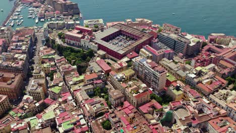 Italian-european-city-town-Naples-high-and-wide-angle-panorama-view-from-drone-with-scenery-cinematic-style-of-seashore,-boats,-ships-and-houses