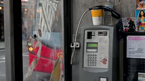 Bus-and-Coffee-within-an-Old-London-Telephone-Box,-United-Kingdom