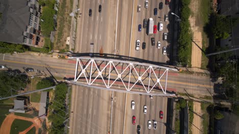 Birds-eye-view-of-car-traffic-on-59-South-freeway-in-Houston,-Texas