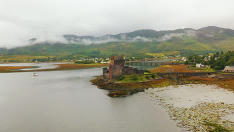 Aerial-View-Of-The-Historic-Eilean-Donan-Castle-By-Dornie-In-Autumn,-Scotland