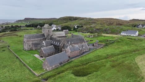 Aerial-View-of-Iona-Abbey-and-Nunnery,-Ancient-Monastery-and-Landmark-of-Isle-of-Mull,-Scotland-UK