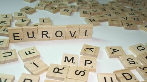 Right-hand-forms-word-EUROVISION-from-letter-tiles-of-Scrabble-game