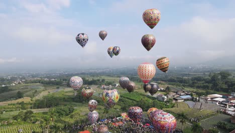 Aerial-view,-hot-air-balloon-festival-in-Kembaran-village,-Wonosobo