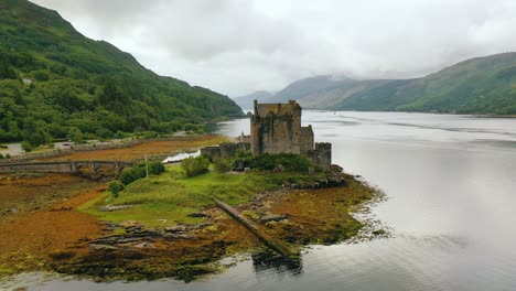 Aerial-View-of-Scottish-Castle-Eilean-Donan-on-Loch-Duich-in-the-Scottish-Highlands,-Scotland,-United-Kingdom,-Europe