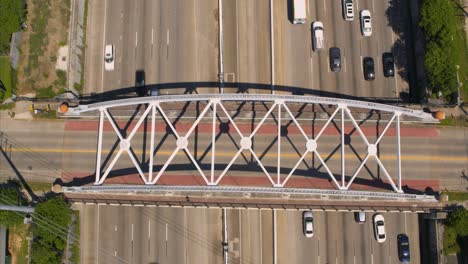 Birds-eye-view-of-car-traffic-on-59-South-freeway-in-Houston,-Texas
