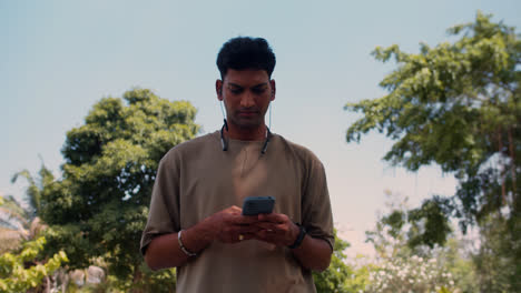 Man-using-smartphone-outdoors