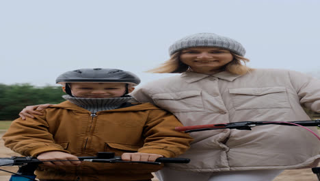 Mom-and-son-smiling-at-camera