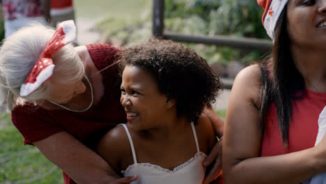 Grandmother,-mother-and-kids-having-fun-outdoors