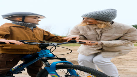 Mom-teaching-son-how-to-ride-bike