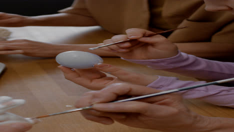 People-painting-Easter-ornaments