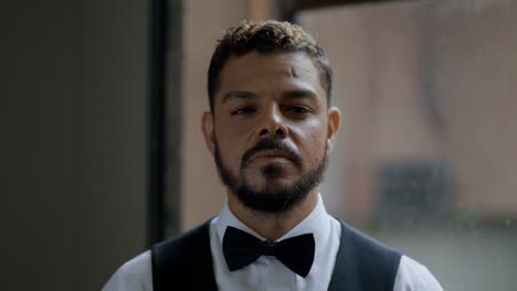 Latin-groom-looking-at-the-camera