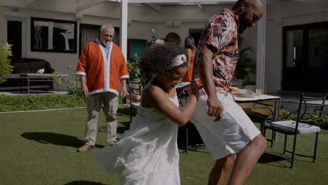 Happy-family-having-fun-outdoors