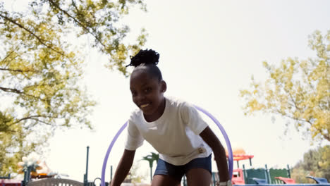 Young-girl-playing-at-the-park